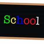 Cartoon chalkboard that says, "School" on it. School can be overhwleming.