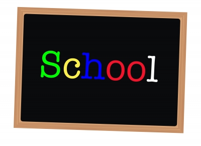 Cartoon chalkboard that says, "School" on it. School can be overhwleming.