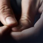 hands picking at nails because of anxiety