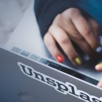 hands on a keyboard as teen does teletherapy