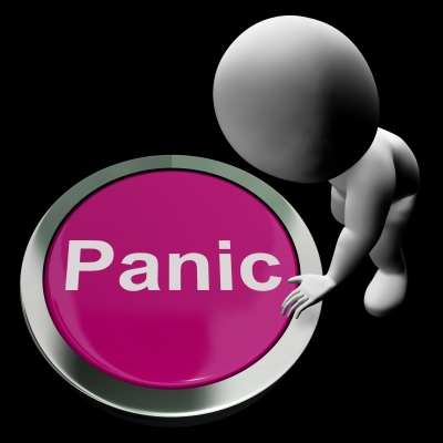 cartoon image of a figure reaching towards large cartoon image that says panic
