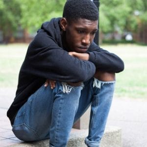 Teen boy suffering with Bipolar Disorder.